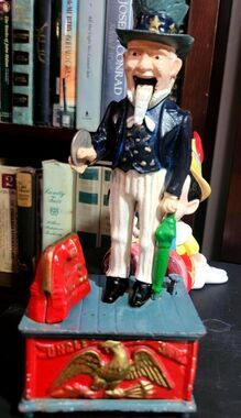 VTG Patriotic Cast Iron Mechanical Coin Bank Uncle Sam in Red White & Blue 12"H